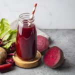 Glass of fresh beetroot juice with vegetables